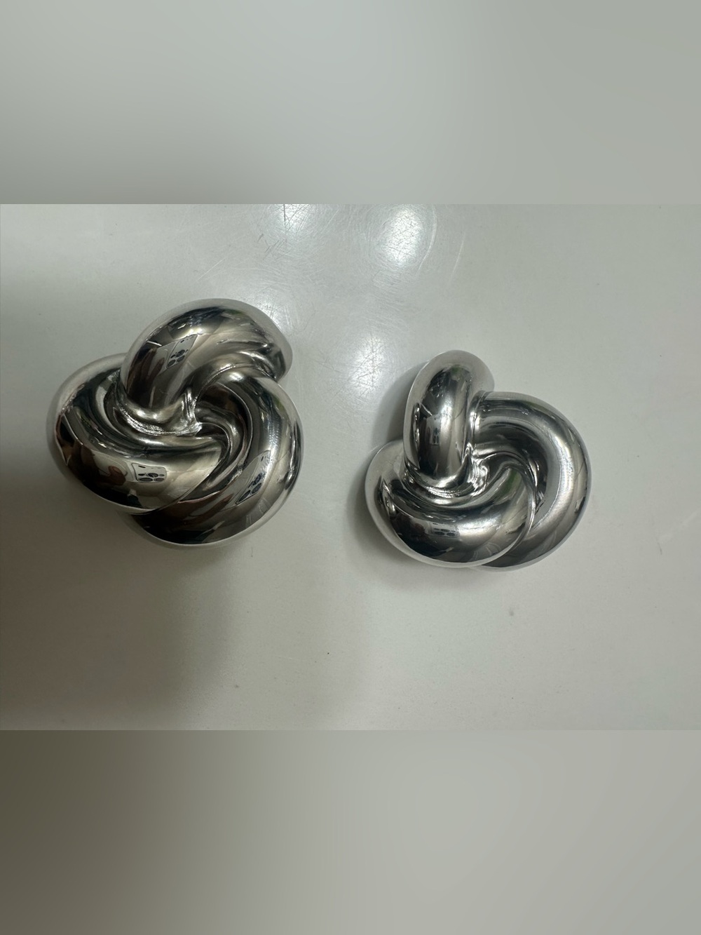 Saint Laurent Silver Knot Sculpture Clip-On Earrings